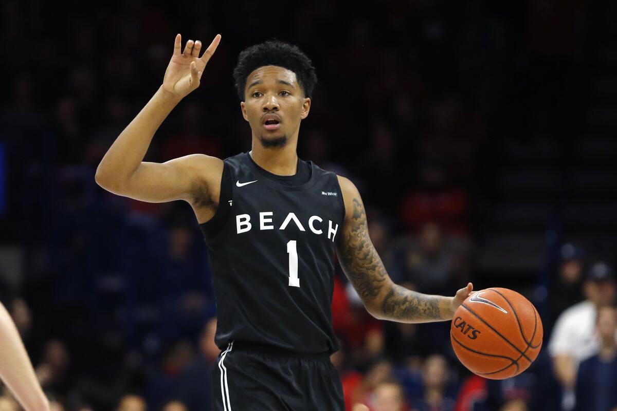 Long Beach State guard Michael Carter III is shown against Arizona on Nov. 24, 2019.