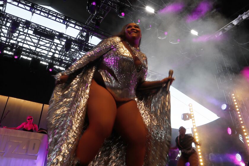 INDIO, CALIF. - APRIL 14, 2019. Rapper-singer Melissa Viviane Jefferson, also as Lizzo, performs on day three of the Coachella Music And Arts Festival at the Empire Polo Grounds in Indio on Sunday, April 14, 2019. (Luis Sinco/Los Angeles Times)