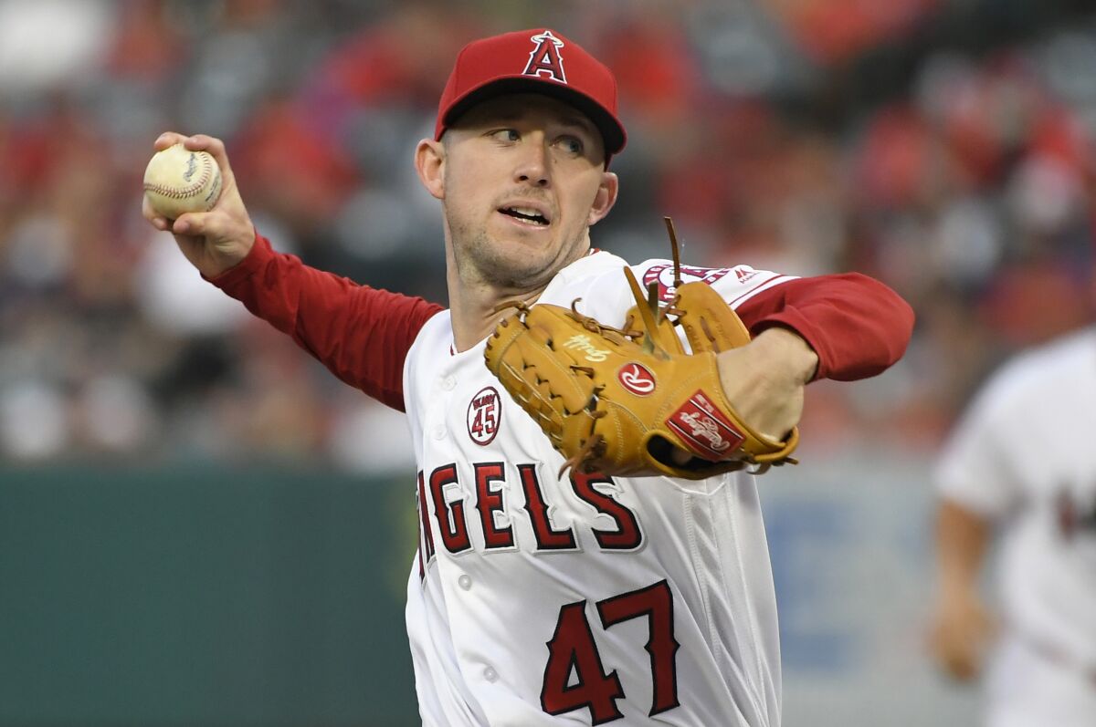 Angels pitcher Griffin Canning will begin the season on the disabled list after experiencing elbow soreness following his first spring start.