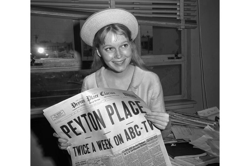 June 16, 1964: Mia Farrow, 17, daughter of Maureen O'Sullivan, appears at Santa Monica Superior Court to have 20th Century -Fox contract for TV series based on "Peyton Place" approved. This photo appeared in the July 17 1964, Los Angeles Times.