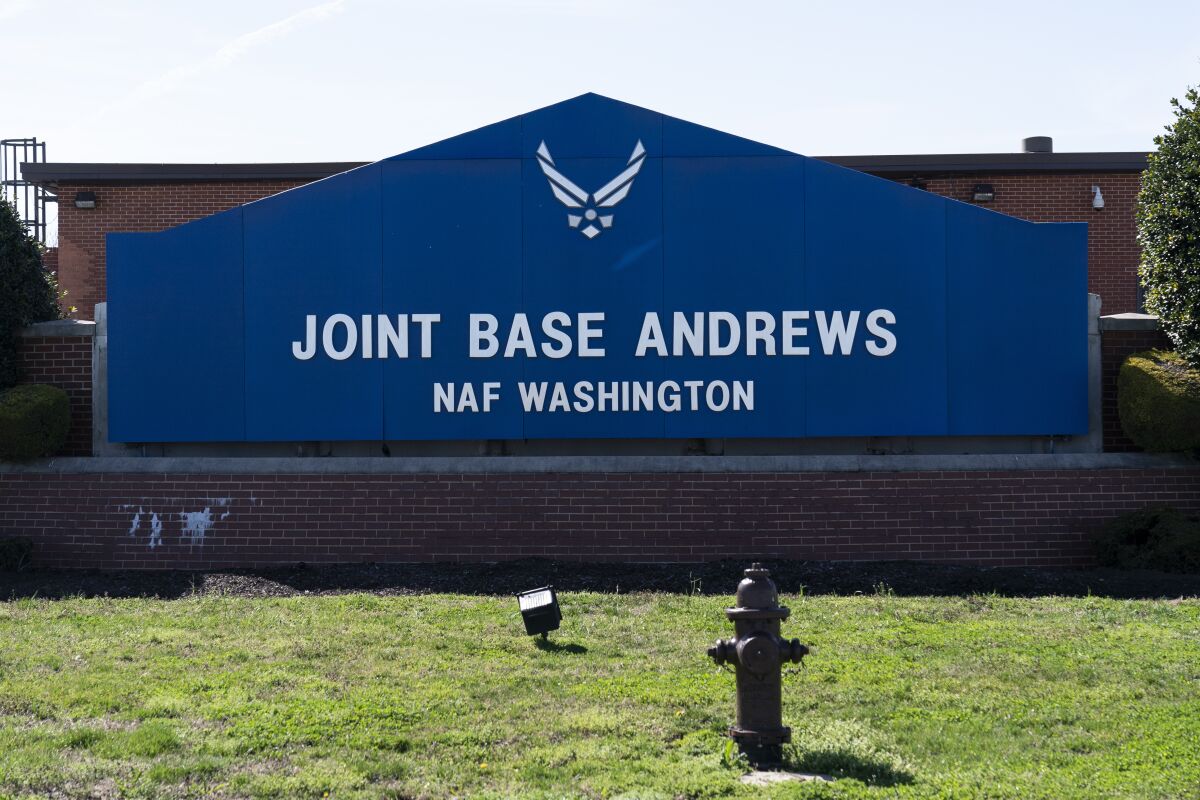 FILE - The sign for Joint Base Andrews is seen, Friday, March 26, 2021, at Andrews Air Force Base, Md. An intruder has breached the home of Air Force One, one of the nation's most sensitive military bases, and this time a resident opened fire on the trespasser, Joint Base Andrews said in a statement late Monday, Feb. 6, 2023. (AP Photo/Alex Brandon, File)
