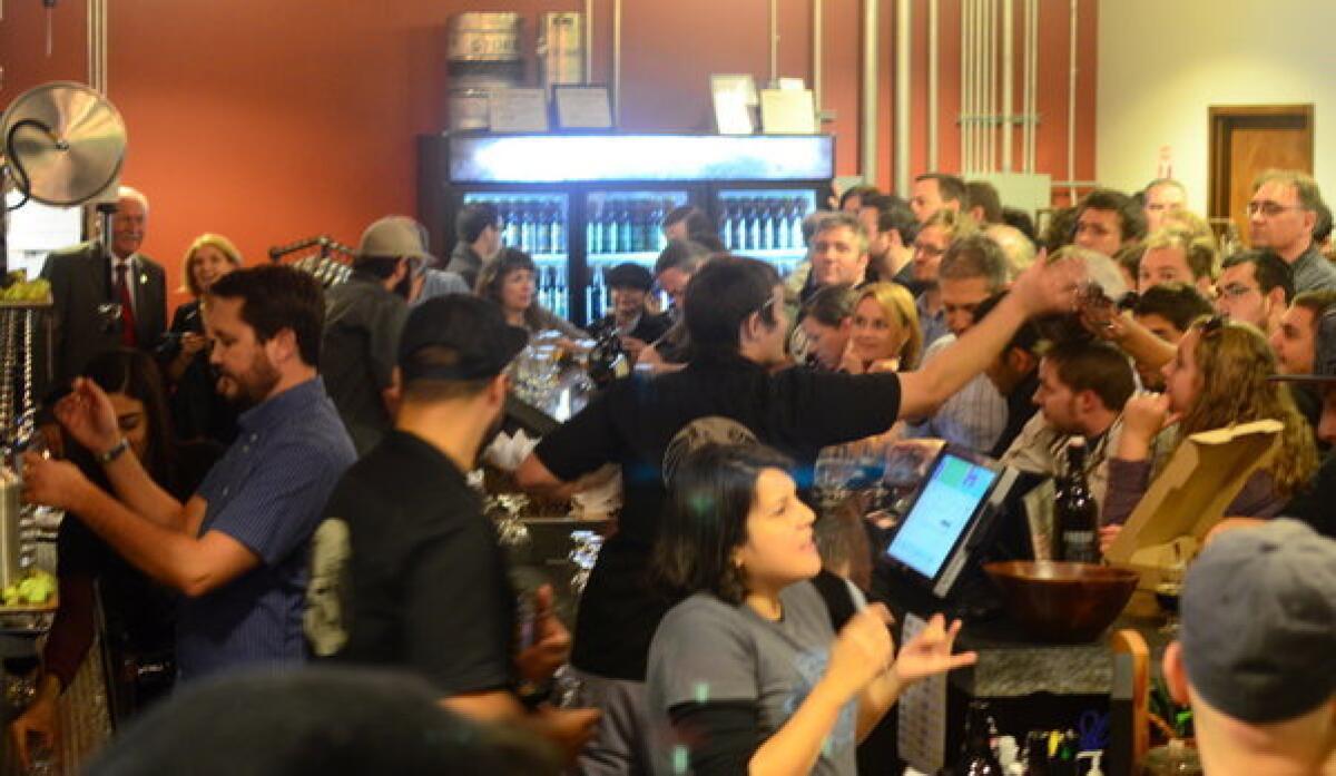 Wil Wheaton works the taps at Pasadena's Stone Brewing.