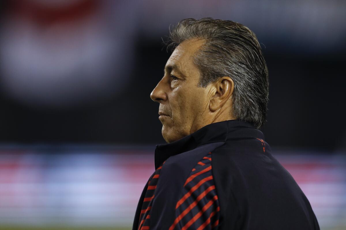 Chivas head coach Tomas Boy looks on before a Colossus Cup soccer match against River Plate Friday, June 28, 2019, in San Diego. (AP Photo/Gregory Bull)