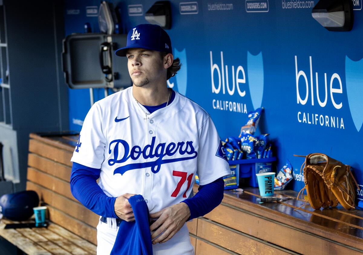 Dodgers starting pitcher Gavin Stone stands in the dugout during a game against the St. Louis Cardinals on March 31.