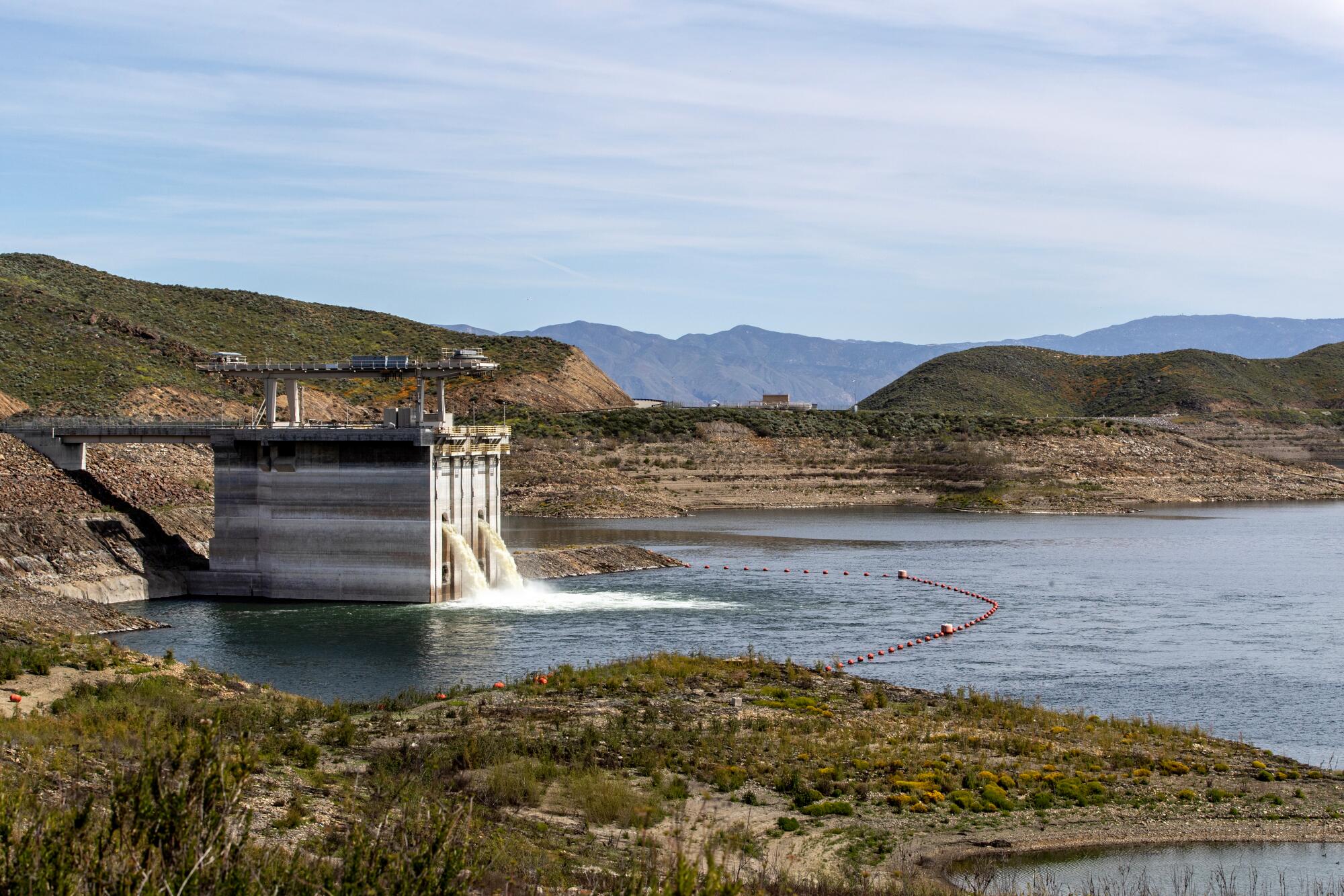 Water cascades into Diamond Valley Lake from an inlet/outlet tower in Winchester, Calif., near Hemet.
