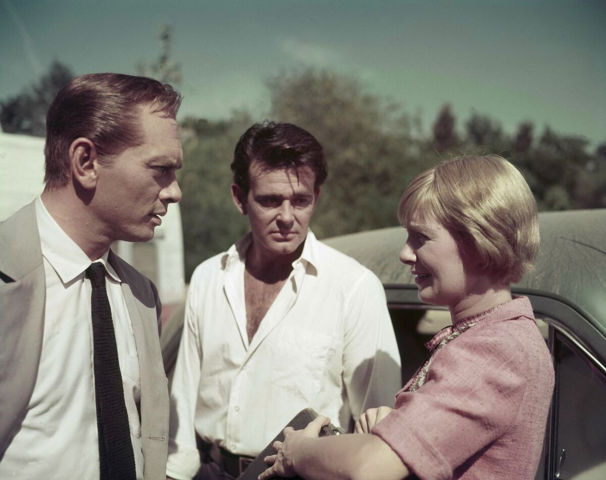 Actors Yul Brynner, left, Stuart Whitman and Joanne Woodward, on the set of "The Sound and the Fury" in Louisiana on Dec. 18, 1958.