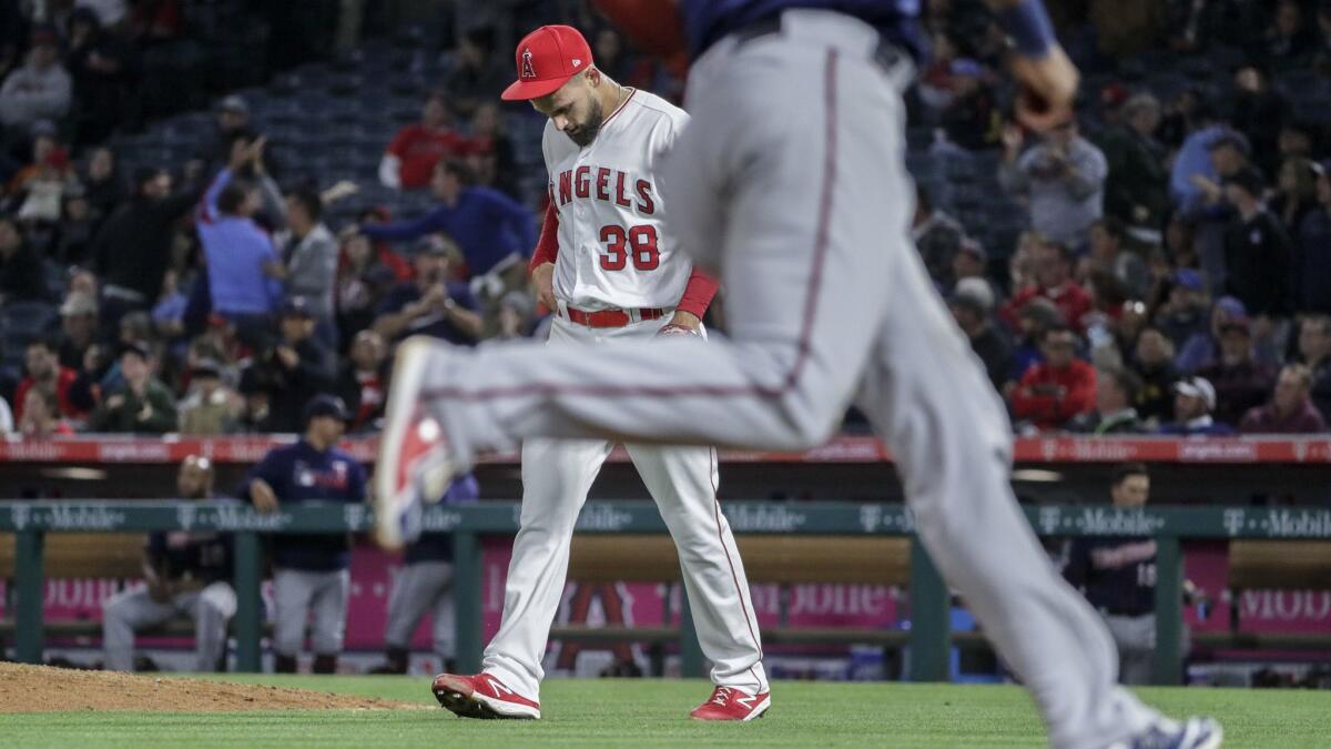 Angels reliever Justin Anderson reacts after allowing a game-tying, two-run homer to the Twins' Marwin Gonzalez in the sixth inning May 21. Minnesota scored all of its runs in the final four innings after L.A. starter Trevor Cahill gave up none through the first five.