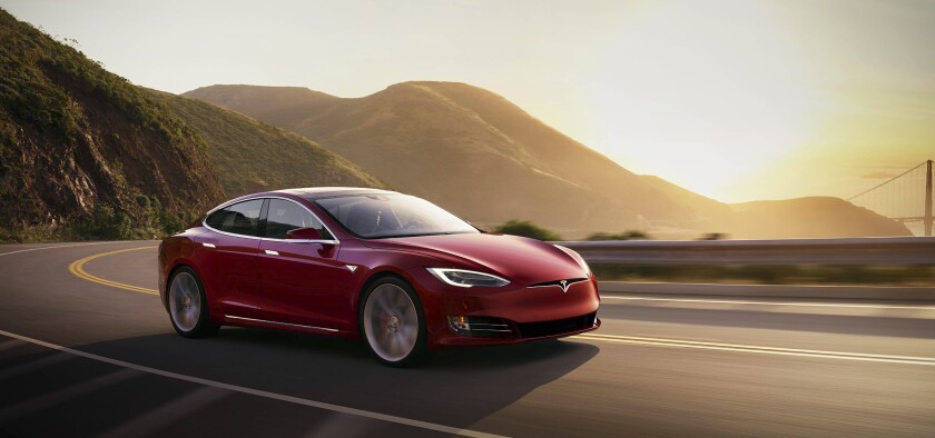 This photo provided by Tesla shows the 2021 Tesla Model S, a premium electric sedan with an estimated range of 412 miles. (Courtesy of Tesla via AP)