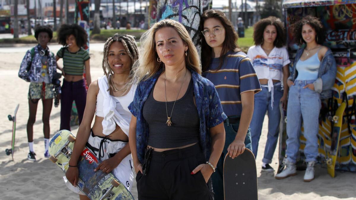 The NYC skateboarding collective known as the Skate Kitchen, from left in back, Kabrina Adams, Ajani Russell, Dede Lovelace, Rachelle Vinberg, Jules Lorenzo, and Brenn Lorenzo, star in their own film, directed by Crystal Moselle, center.