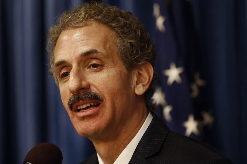LOS ANGELES, CA-AUGUST 22, 2017: Los Angeles City Attorney Mike Feuer holds a news conference at City Hall in downtown Los Angeles to announce that the city of Los Angeles is suing President Trump's Department of Justice, claiming that new conditions requiring police to cooperate with immigration enforcement officials to qualify for anti-crime funding are unconstitutional and should be blocked. (Mel Melcon/Los Angeles Times)