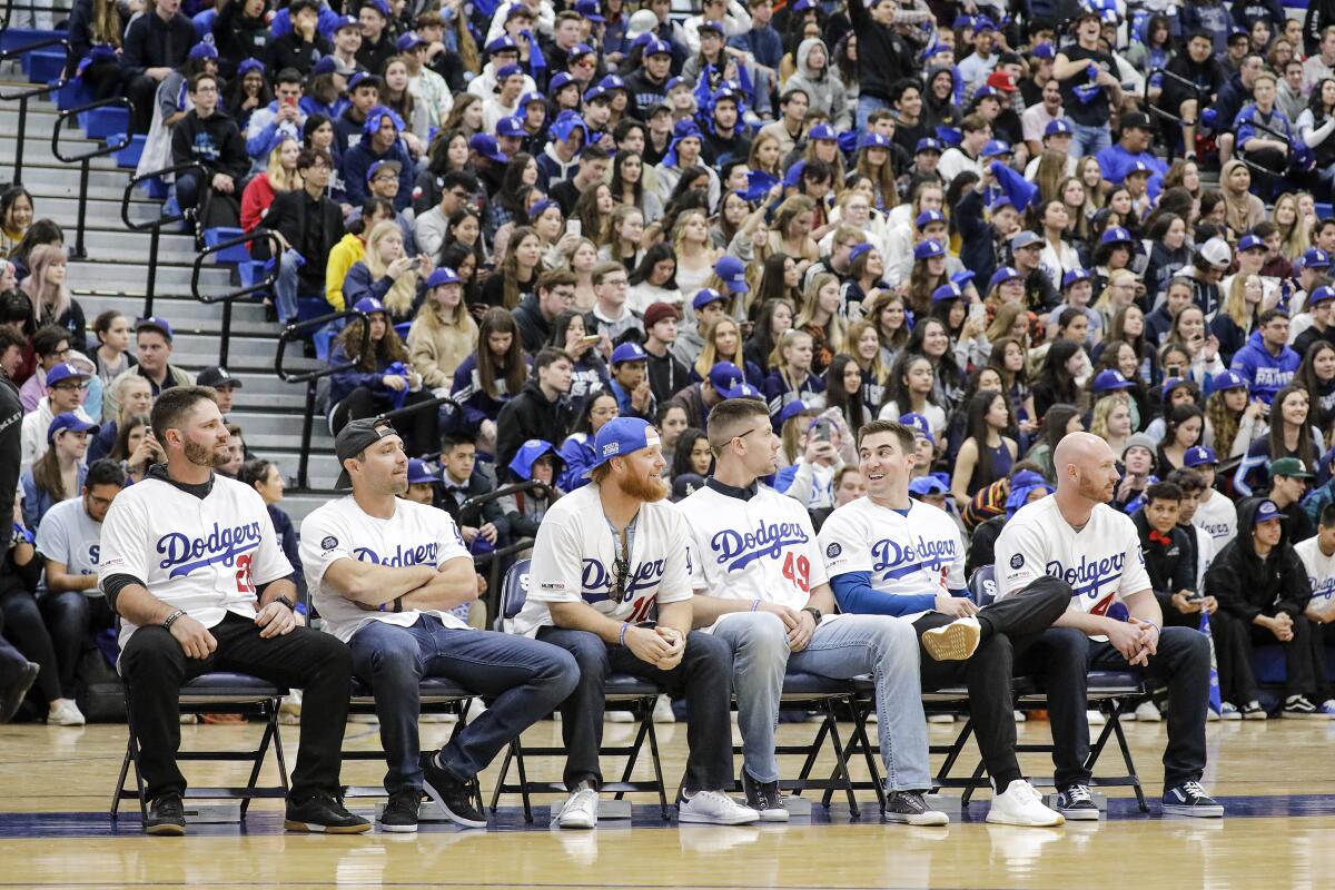 Dodgers players attend a pep rally at Saugus High School in Santa Clarita on Friday.