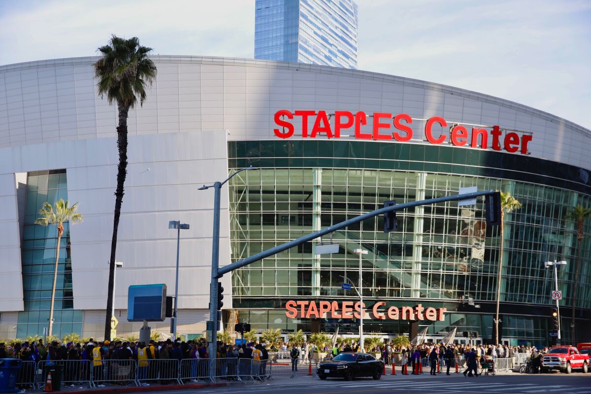 Fans gather outside Staples Center, which will soon be renamed Crypto.com Arena.