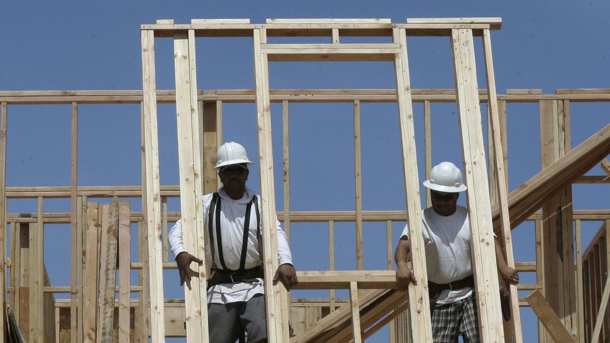 The construction industry gained the most jobs in April of any industry sector in California. Here, a house is under construction near Roseville, Calif.