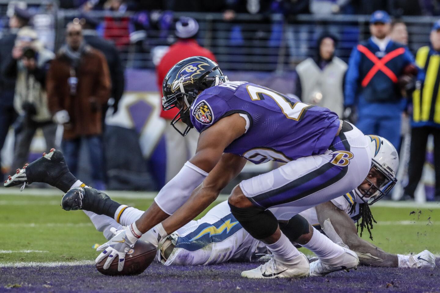 Ravens cornerback Marlon Humphrey scoops up an apparent fumble by Chargers running back Melvin Gordon and returns it 100-yards for a touchdown that was called back after a replay review early in the fourth quarter.