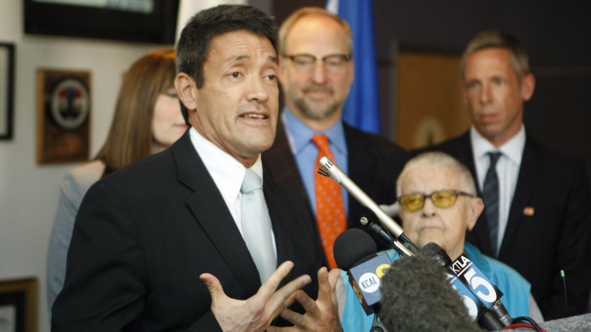 A former West Hollywood City Council deputy has accused the city of firing her for being a whistleblower about alleged sexual harassment by Councilman John Duran, pictured here in a 2012 press conference.