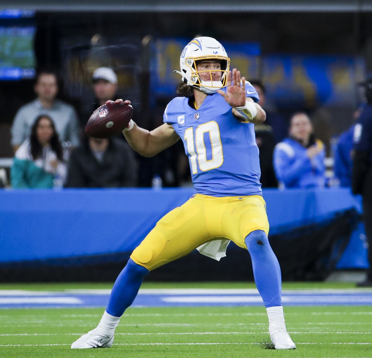  Chargers quarterback Justin Herbert prepares to throw against the Dolphins.