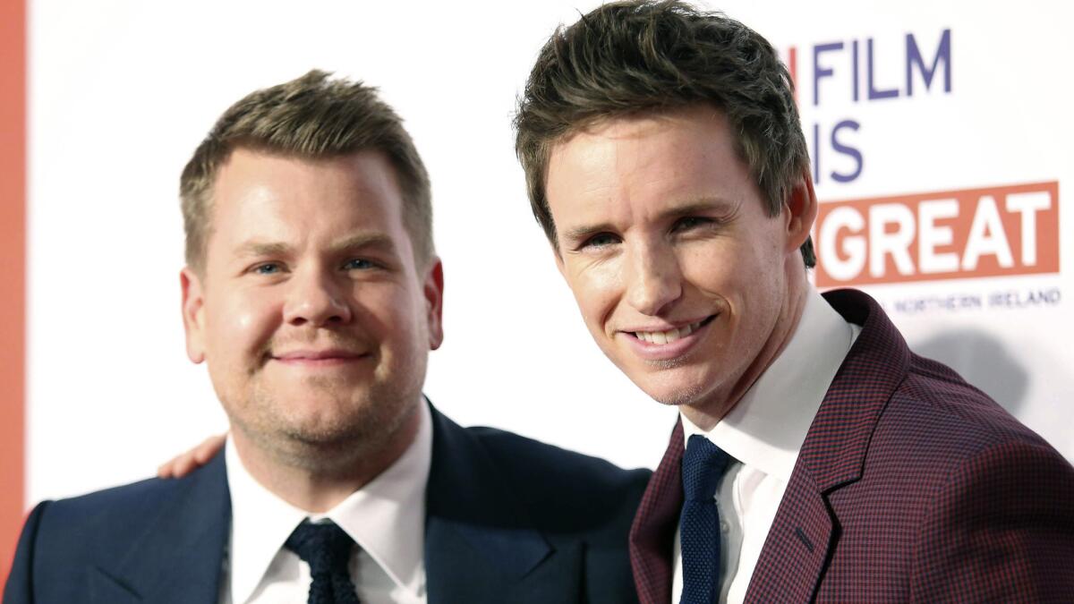 James Corden and Eddie Redmayne arrive at the 2016 Film Is Great reception at Fig & Olive in West Hollywood on Friday.