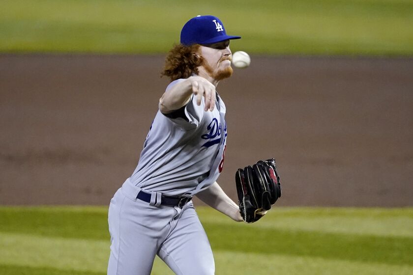 Los Angeles Dodgers starting pitcher Dustin May throws against the Arizona Diamondbacks during the first inning of a baseball game, Thursday, Sept. 10, 2020, in Phoenix. (AP Photo/Matt York)