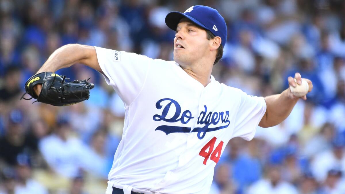 The Dodgers' Rich Hill pitches in the first inning.