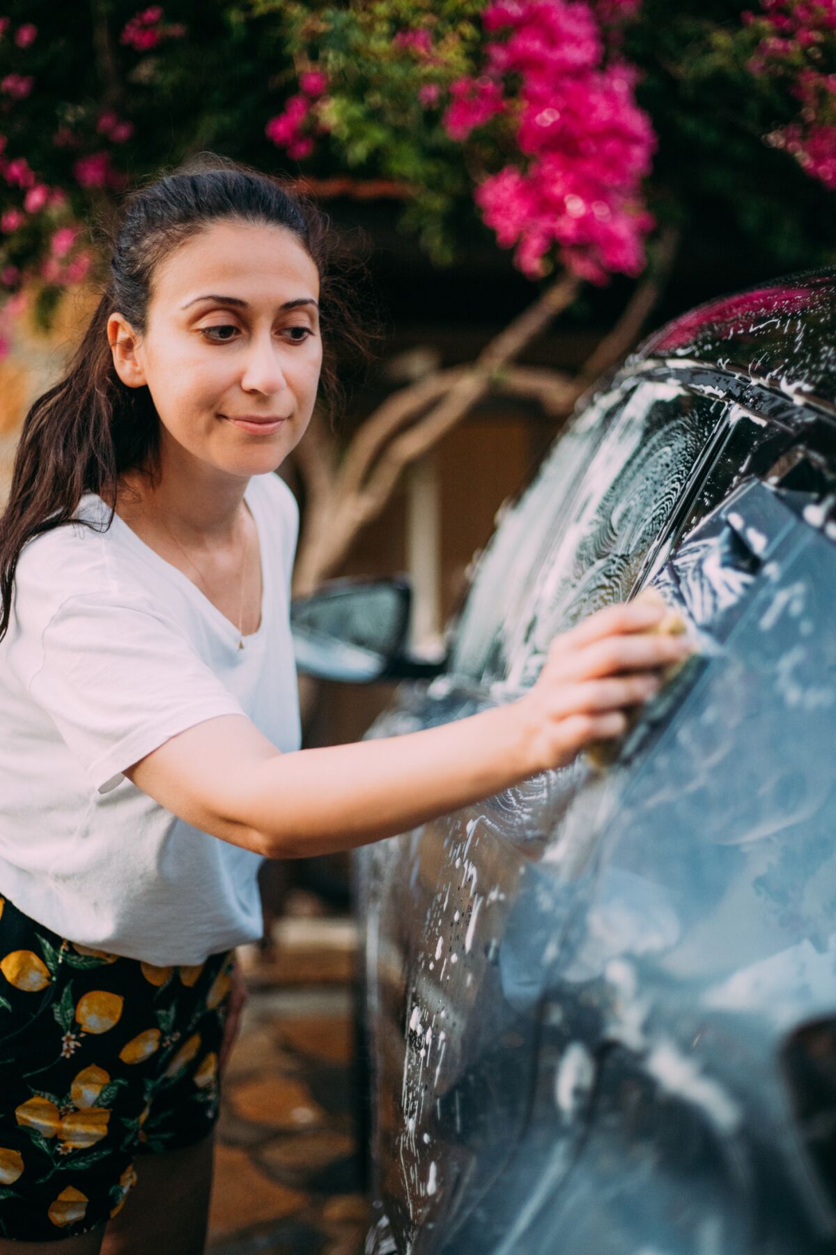 Professional car washes are best, but if you wash at home, use biodegradable soaps and wash your car on a permeable surface.