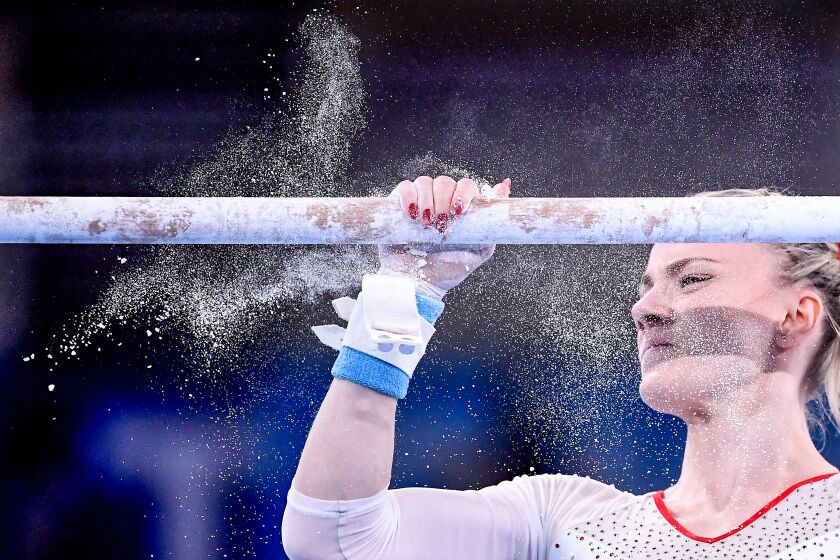 -TOKYO,JAPAN July 24, 2021: Poland's Gabriela Sansal prepares to compete on the uneven bars in the women's team qualifying at the 2020 Tokyo Olympics. (Wally Skalij /Los Angeles Times)