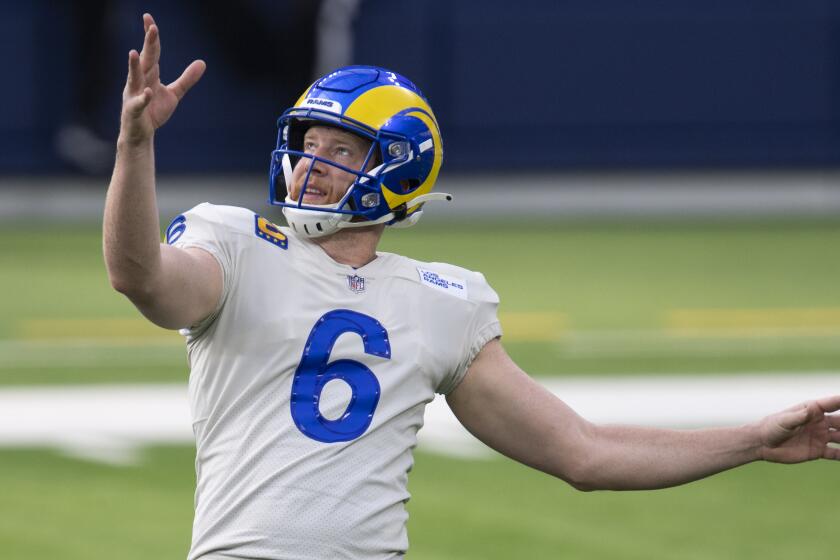 Los Angeles Rams punter Johnny Hekker (6) punts during an NFL football game against the New York Jets Sunday, Dec. 20, 2020, in Inglewood, Calif. (AP Photo/Kyusung Gong)