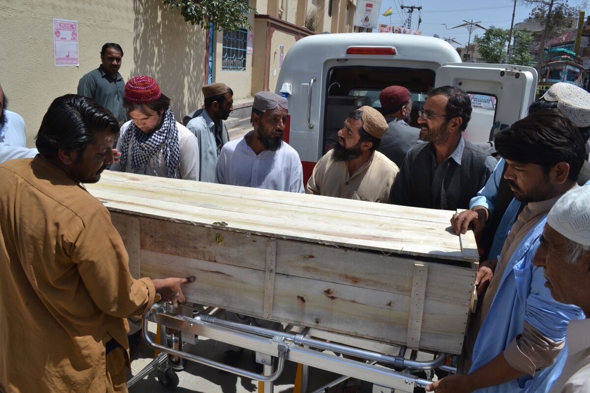 A coffin carries one of the victims of a U.S. drone strike in Pakistan. Afghan Taliban leader Mullah Akhtar Mohammad Mansour was killed in the strike.