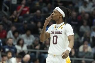 Arizona State's DJ Horne reacts after hitting a 3-point shot during the first half of a First Four college basketball game against Nevada in the NCAA men's basketball tournament, Wednesday, March 15, 2023, in Dayton, Ohio. (AP Photo/Darron Cummings)