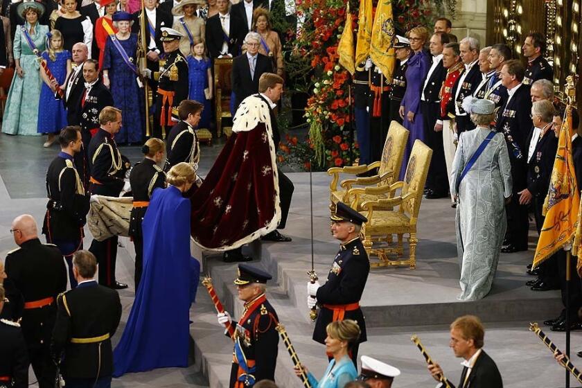 Dutch King Willem-Alexander of the Netherlands arrives with his wife Queen Maxima for his inauguration at the Nieuwe Kerk (New Church) in Amsterdam.