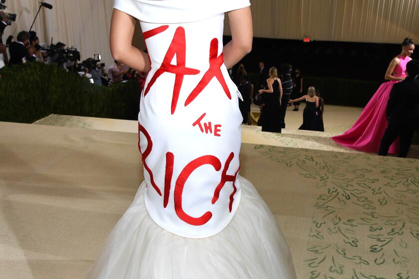 NEW YORK, NEW YORK - SEPTEMBER 13: Alexandria Ocasio-Cortez attends The 2021 Met Gala Celebrating In America: A Lexicon Of Fashion at Metropolitan Museum of Art on September 13, 2021 in New York City. (Photo by Kevin Mazur/MG21/Getty Images For The Met Museum/Vogue)