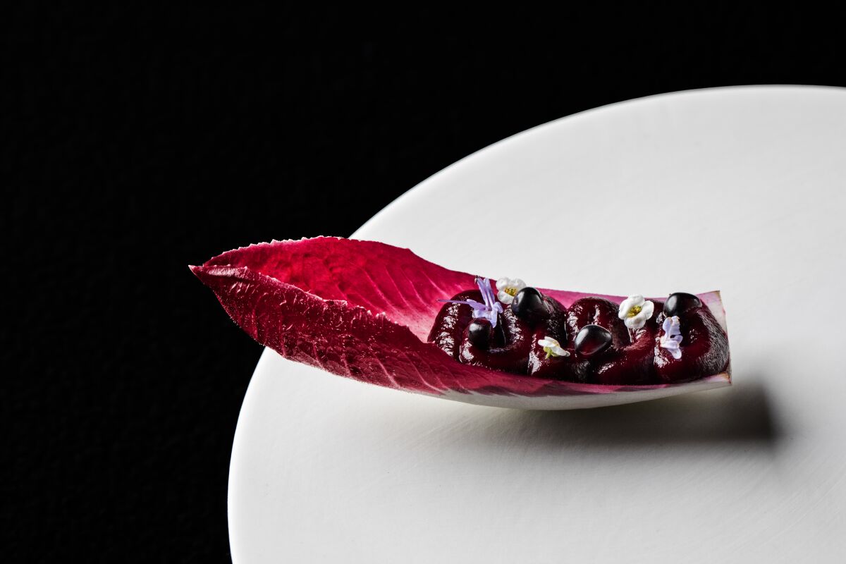Endive with beet root and blackberry at Addison restaurant.