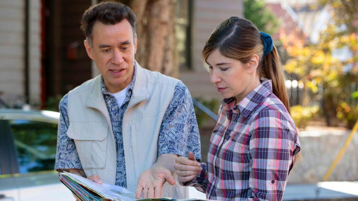 This image released by IFC shows Fred Armisen, left, and Carrie Brownstein in a scene from "Portlandia,"