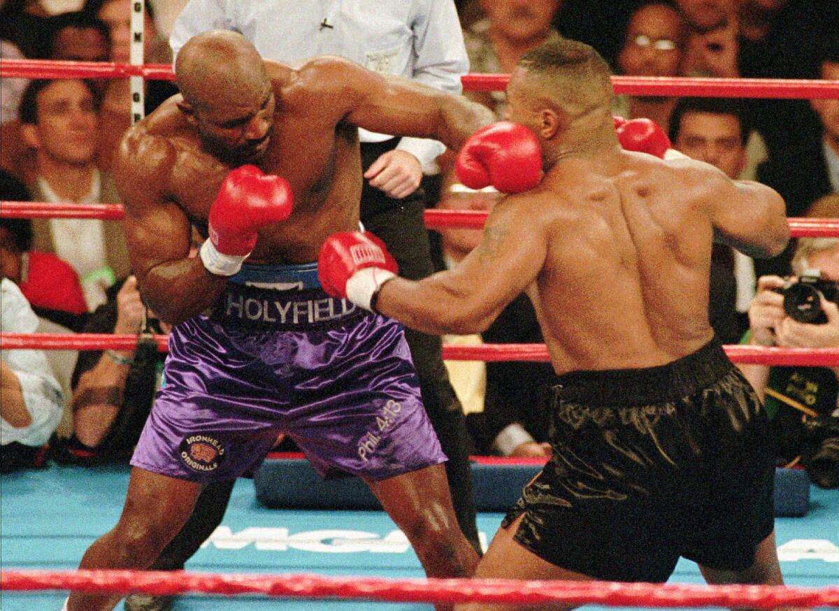 Evander Holyfield looks to come to terms with Mike Tyson in new documentary  - Los Angeles Times