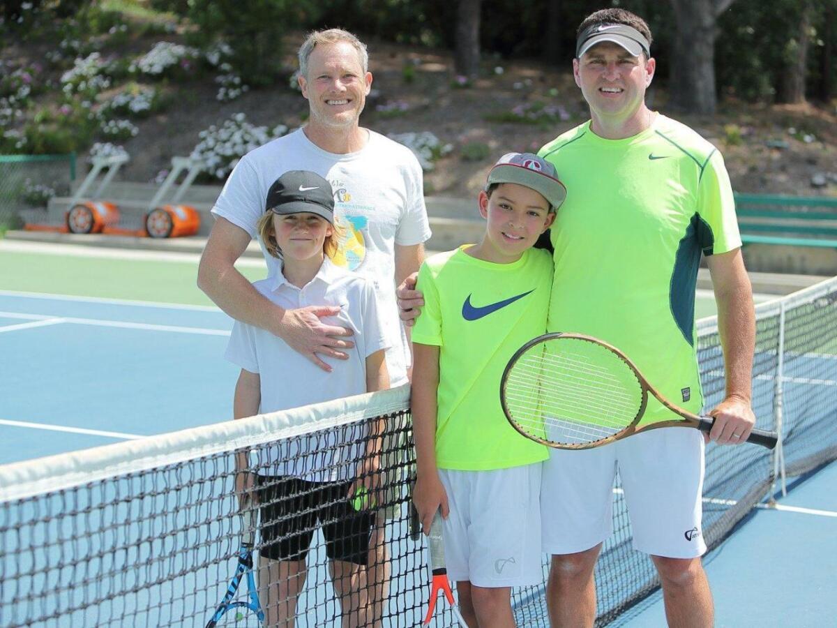 Christian and Ethan Carson and Tyler and Scott Kreit at this year's family tournament at the RSF Tennis Club.