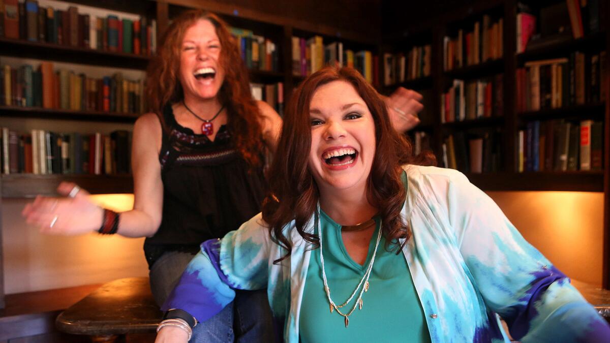 Kacee Clanton, left, and Mary Bridget Davies portray the singer in the play “A Night With Janis Joplin.”