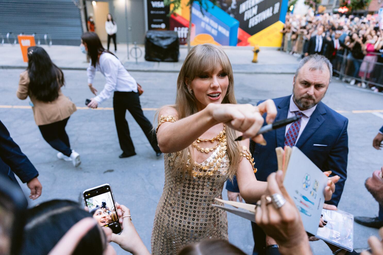 Taylor Swift Gives Gilded Glamour at the 2022 Toronto International Film  Festival - Fashionista