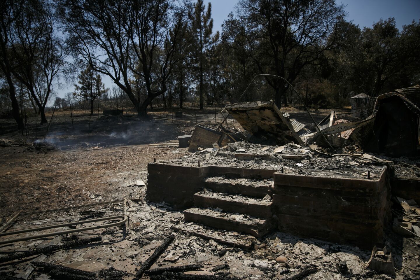 A home burned down by the Detwiler fire in Mariposa, Calif.