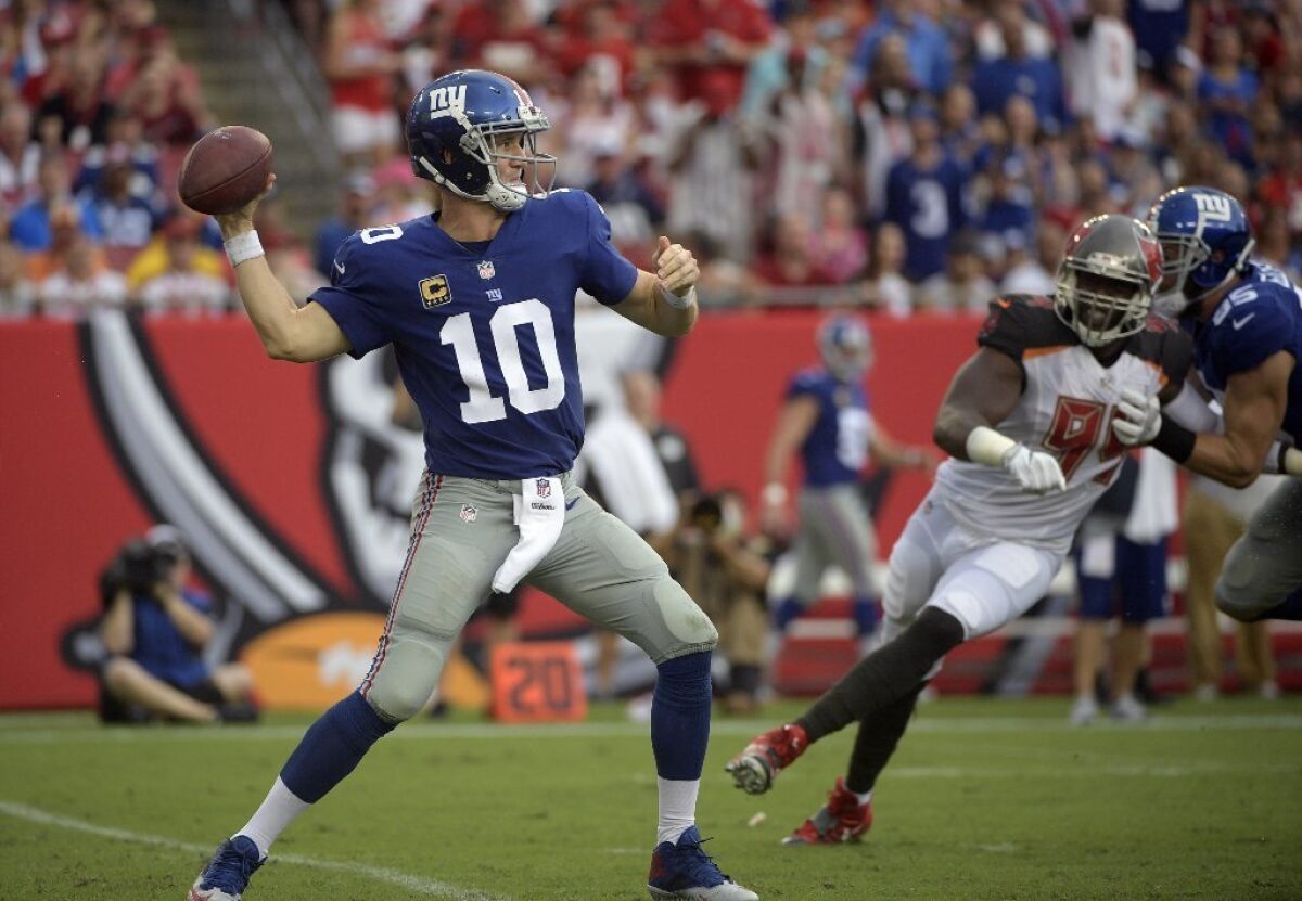 Giants quarterback Eli Manning throws a pass against the Tampa Bay Buccaneers during a game on Oct. 1.