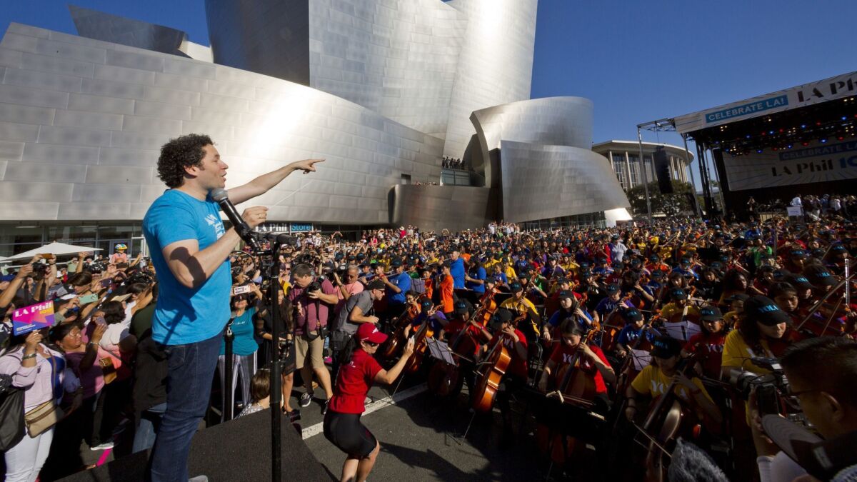 L.A. Phil Music and Artistic Director Gustavo Dudamel kicks off the "Celebrate LA!" CicLAvia event Sunday morning outside the Walt Disney Concert Hall.