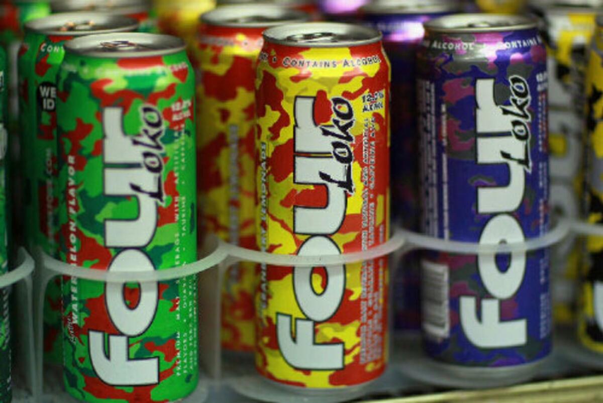 Twenty state attorneys general and the San Francisco city attorney announced Tuesday a settlement with the maker of Four Loko to curb its marketing efforts.