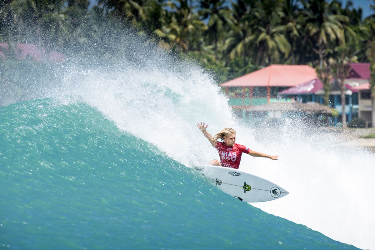 Ella McCaffray competes at Nias Pro in Indonesia.