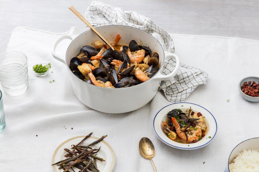 LOS ANGELES, CALIFORNIA - Jan. 23, 2020: Ben Mims' Cajun Seafood Stew served with a side of Spicy Sausage, Crispy Okra, and Rice photographed on Thursday, Jan. 23, 2020, at PropLink studio in Arts District, Los Angeles. Food Stylist: Ben Mims, Prop Stylist: Rebecca Buenik. (Silvia Razgova / For The Times) Assignment ID: 479829