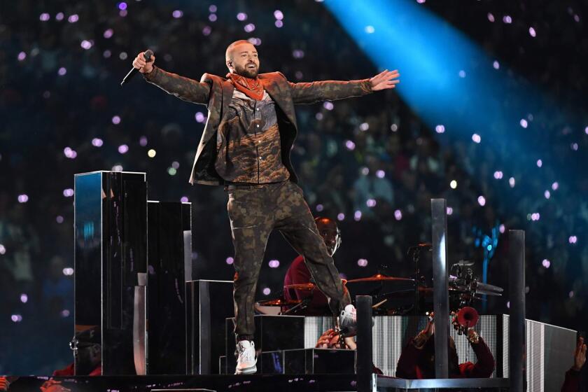 TOPSHOT - Justin Timberlake performs on stage during the Super Bowl LII halftime show at the US Bank Stadium in Minneapolis, Minnesota February 4, 2018. / AFP PHOTO / TIMOTHY A. CLARYTIMOTHY A. CLARY/AFP/Getty Images ** OUTS - ELSENT, FPG, CM - OUTS * NM, PH, VA if sourced by CT, LA or MoD **