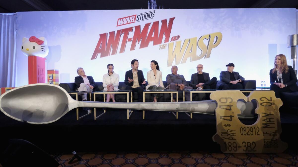 Michael Douglas, left, Hannah John-Kamen, Paul Rudd, Evangeline Lilly, Laurence Fishburne, Peyton Reed, Kevin Feige and Kara Warner at the "Ant-Man and the Wasp" press conference.