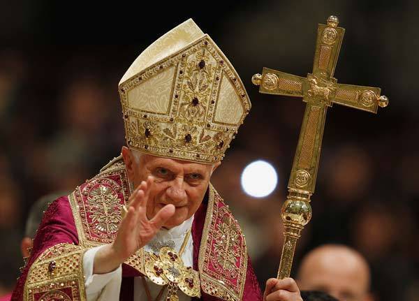 Pope Benedict XVI blesses the faithful at the end of a Vesper prayer in St. Peter's Basilica at the Vatican.