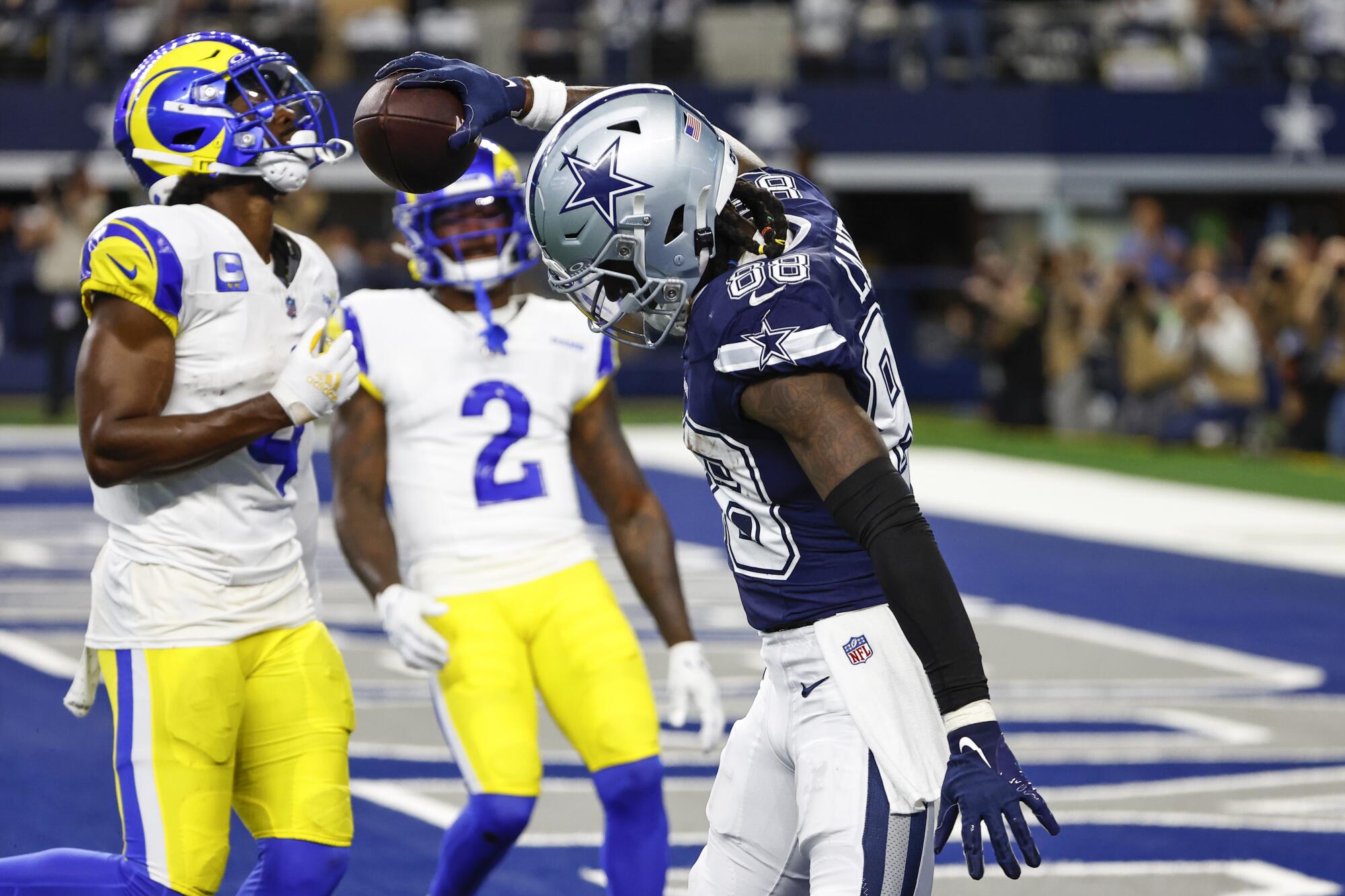 Dallas Cowboys wide receiver CeeDee Lamb celebrates after scoring a touchdown against the Rams at AT&T Stadium.