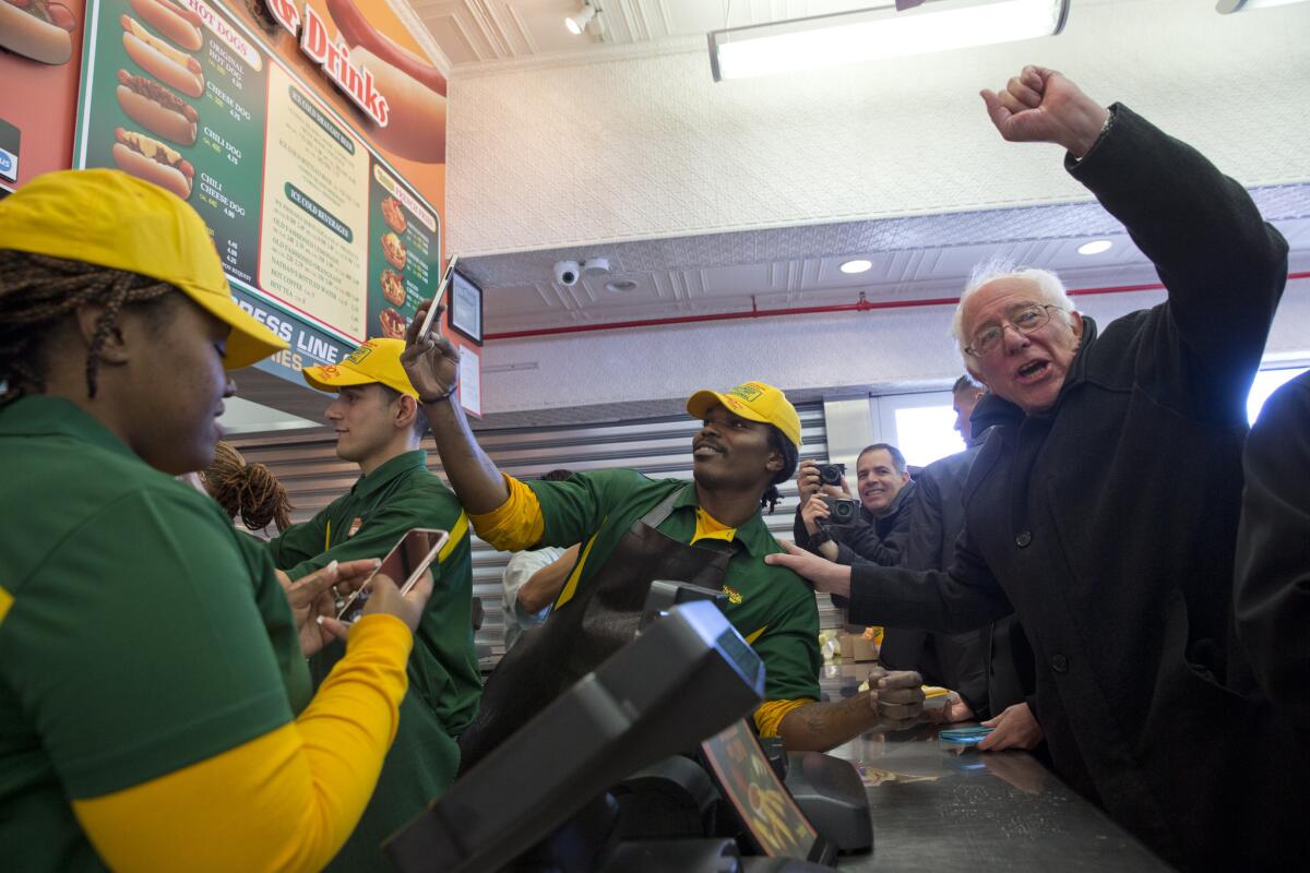 Bernie Sanders orders a hot dog at Nathan’s Famous in Coney Island in New York.