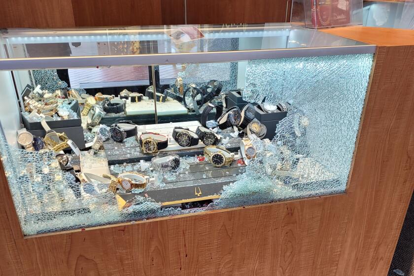 Shattered glass case after heist at jewelry store in Grossmont Center in La Mesa April 5
