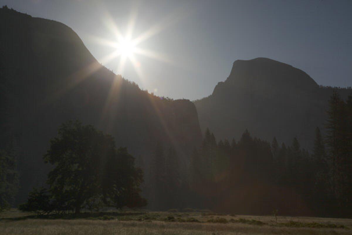 A file photo shows the sun rising over Yosemite National Park.