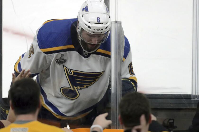 St. Louis Blues' Joel Edmundson enters the penalty box during the second period in Game 2 of the NHL hockey Stanley Cup Final against the Boston Bruins, Wednesday, May 29, 2019, in Boston. (AP Photo/Charles Krupa)